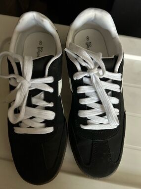 Black and White Low-Top Sneakers with White Laces